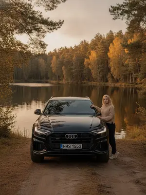 Сделайте живописный снимок у черного автомобиля Audi, стоящего на берегу живописного лесного озера в момент золотого часа. Выберите марку - Audi, Mercedes-Benz или BMW - и создайте гармоничный образ. Нейросеть добавит теплое, мягкое освещение, которое подчеркнет спокойствие позы и создаст атмосферу уюта и путешествия. Если хотите, укажите параметры, такие как рост, телосложение или цвет волос. 